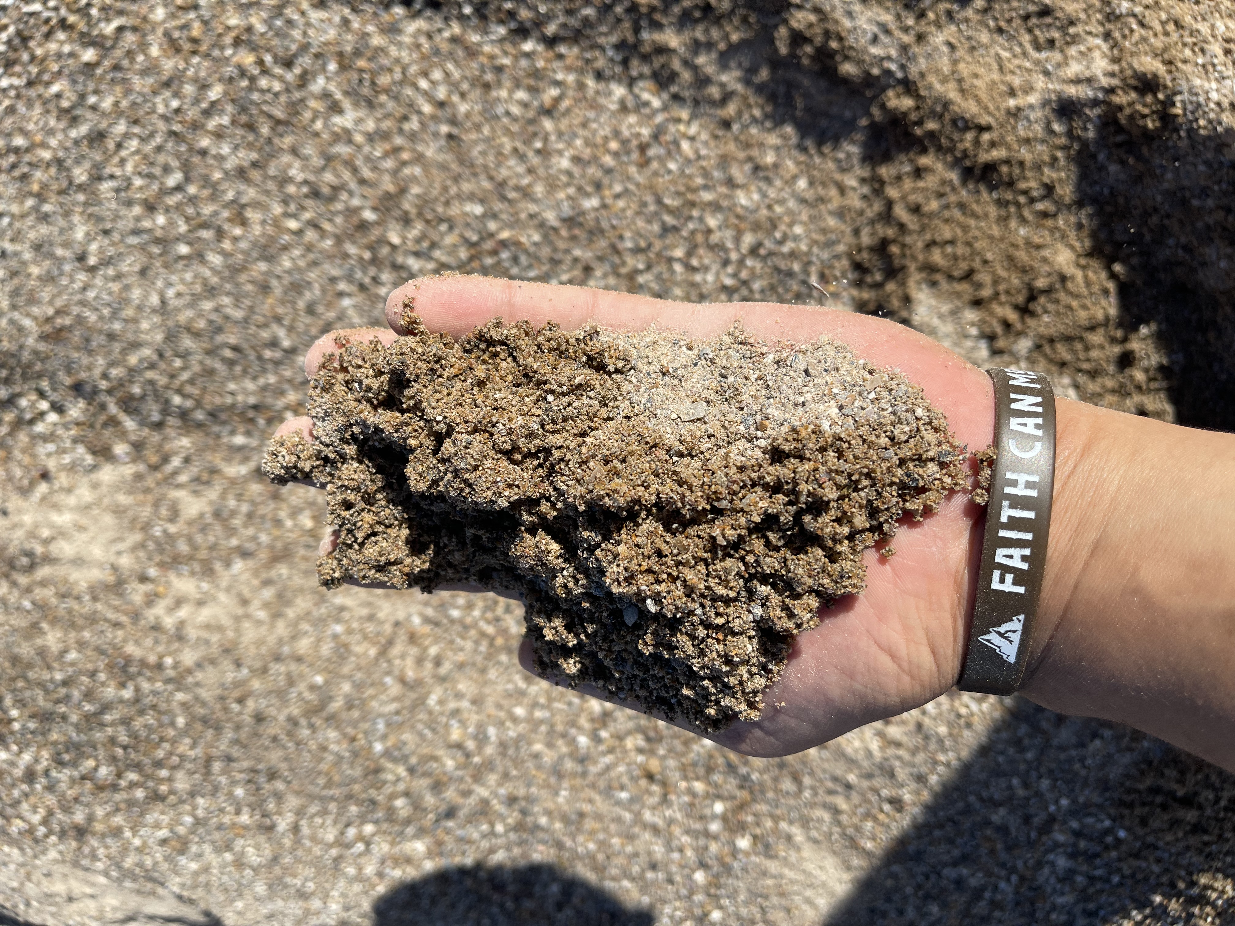 Crushed aggregate base material for road base and structural fill
